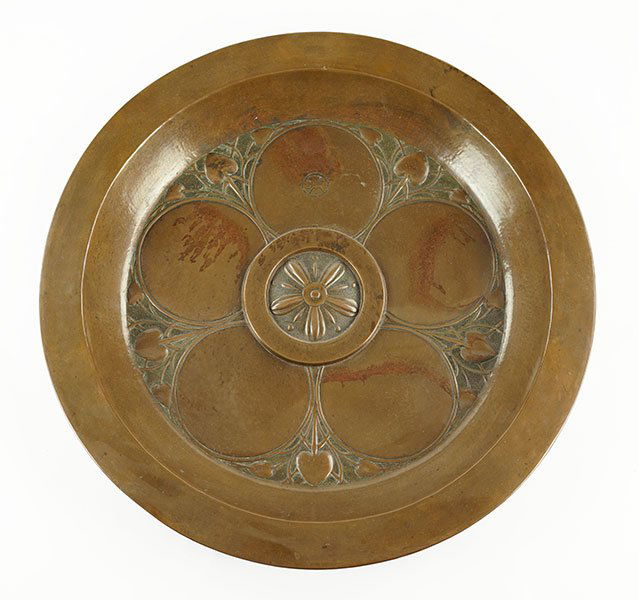 An Arts & Crafts Repousse Copper Charger. (1 of 6)