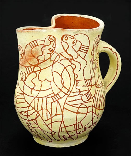 A Glazed Ceramic Pitcher. (1 of 2)