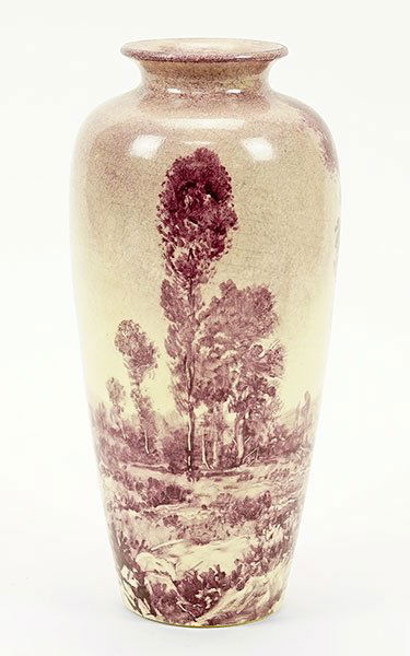 Clement Massier French, 1844-1917) A Vase.: Clement Massier French, 1844-1917) A Vase. Painted and glazed ceramic vase depicts outdoor scenes of trees, field grasses and flowers in tones of purple and cream. Side of vase is signed "M. Alexander