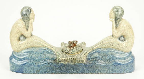 Marcel Guillard (French, 1896-1932) An Inkwell.: Marcel Guillard (French, 1896-1932) An Inkwell. Glazed ceramic inkwel depicts two mermaids facing each other with a covered inkwell between. Mottle blue glaze over wavy base, with cream crackle glaze