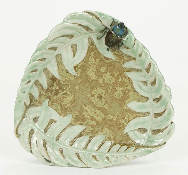 Frederic Debon (1892-?) A Triangular Dish.: Frederic Debon (1892-?) A Triangular Dish. Debon designed for Susse Freres. Stoneware dish with high glaze decoration of leaves and an insect along the rim, with a mottled brown interior. Underside is