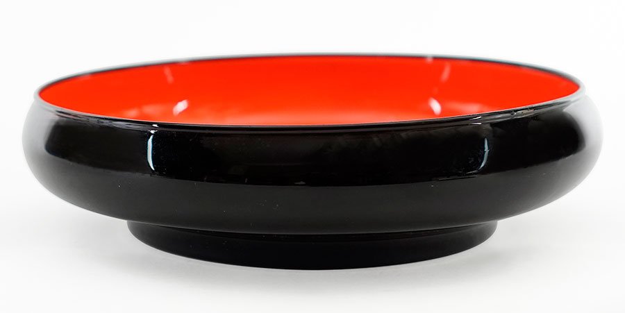 A Loetz Glass Bowl.: A Loetz Glass Bowl. Solid black exterior with a bright orange interior. Circa 1914 2.5" x 10"
