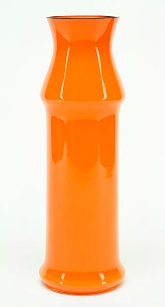 A Loetz Glass Vase.: A Loetz Glass Vase. Cased orange glass with clear overlay. Black enamel over round rim Height: 12"