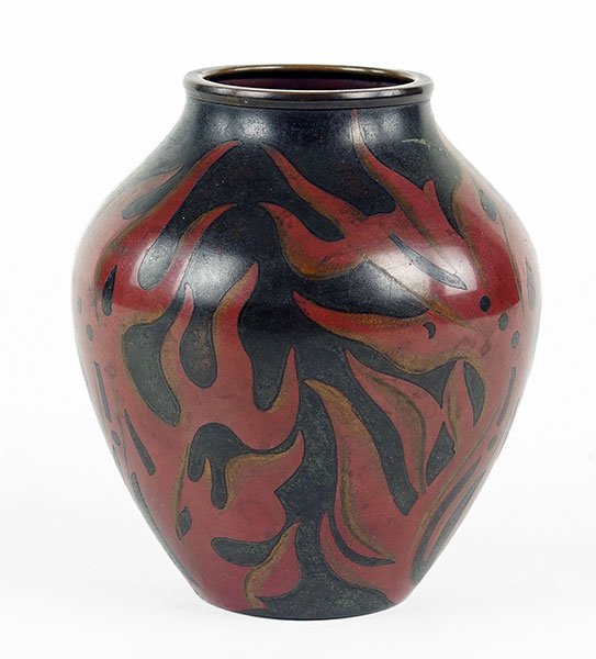 School of Paul Haustein (1880-1944) A Vase.: School of Paul Haustein (1880-1944) A Vase. A WMF AG Ikora Edelmetal vase comprising a brass bade with red flames over chocolate ground, with engraving to bring through gold. Marked "WMF" 5" x 4.5"