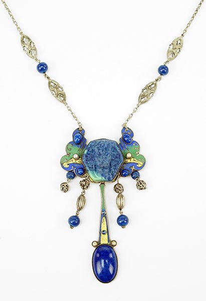 A Carved Stone, Enamel, And White Metal Necklace. (1 of 1)