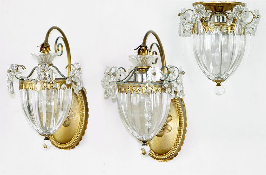 A Pair of Patinated Metal and Glass Wall Sconces. (1 of 1)