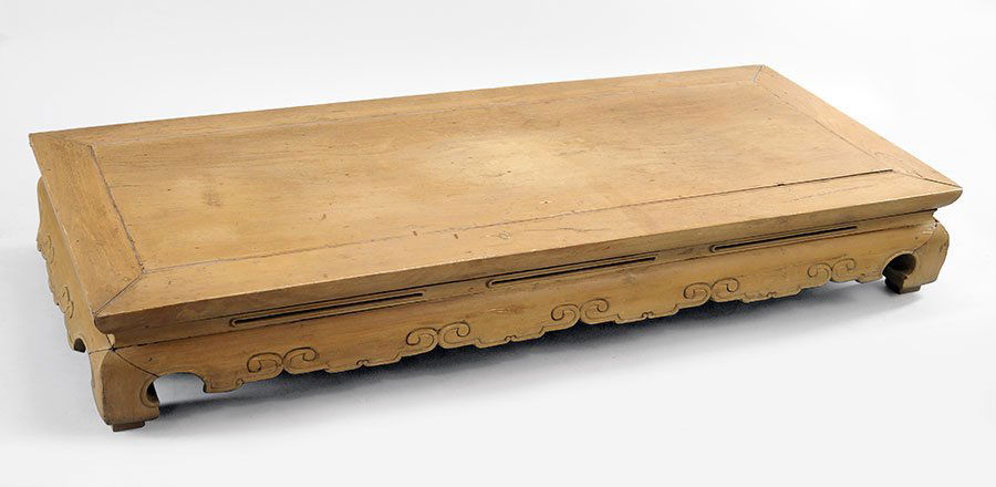 A Carved Wood Low Table.: A Carved Wood Low Table. 11" x 77" x 33"