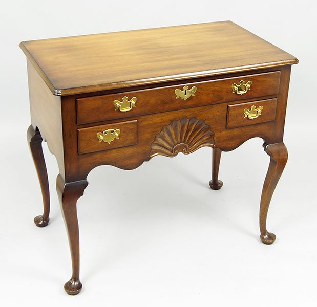 A Kittinger Carved Mahogany Lowboy.: A Kittinger Carved Mahogany Lowboy. 31" x 35" x 20"