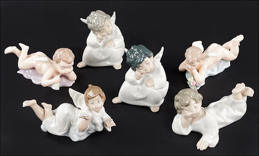 A Group Of LLadro Porcelain Angel Figures. (1 of 1)