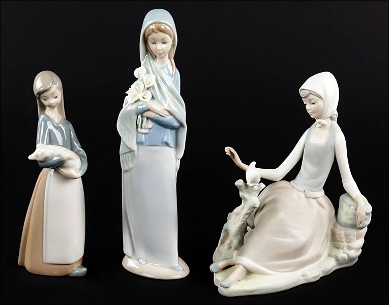 Three Lladro Porcelain Figures Depicting Young Girls. (1 of 1)