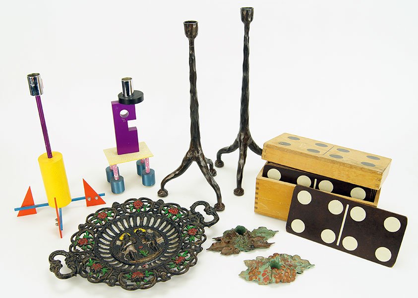 A Pair of Patinated Metal Single Light Candlesticks. (1 of 1)