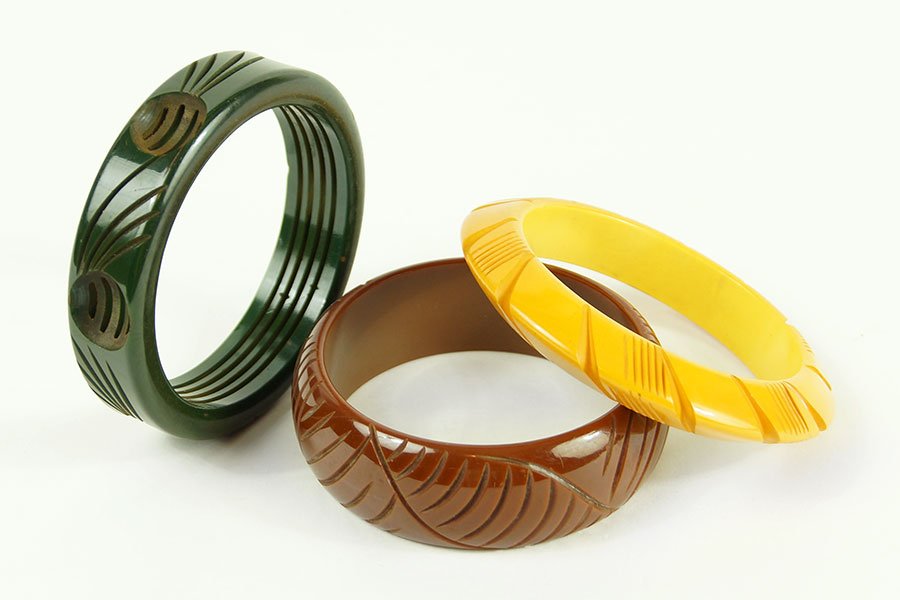 A Spinach Green Carved And Pierced Bakelite Bangle (1 of 1)