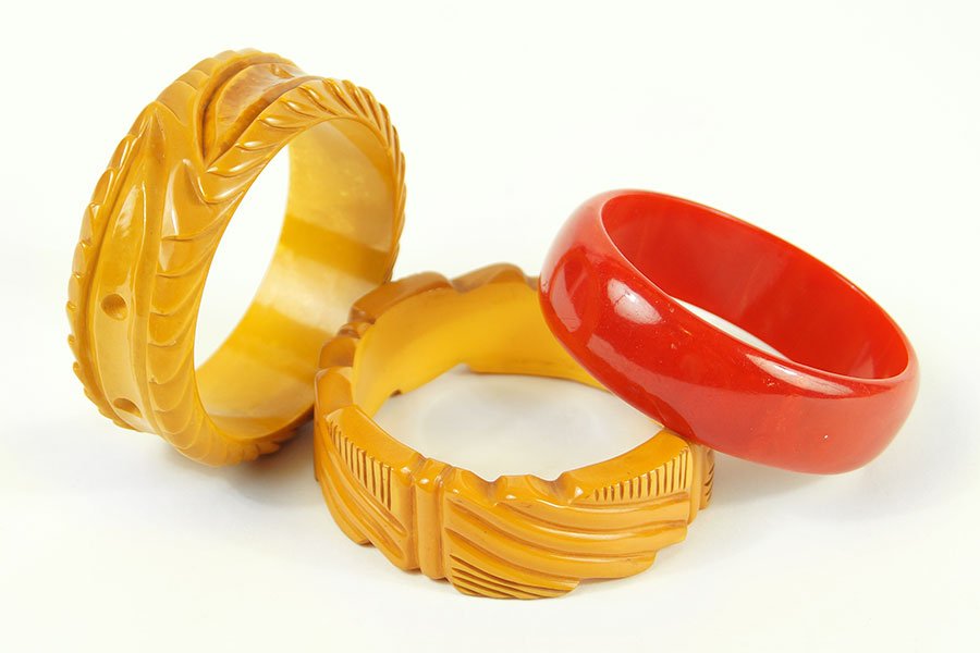 Two Yellow Carved Bakelite Bangle Bracelets. (1 of 1)
