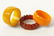 A Mottled Apple Juice Carved Bakelite Bangle Bracelet.
