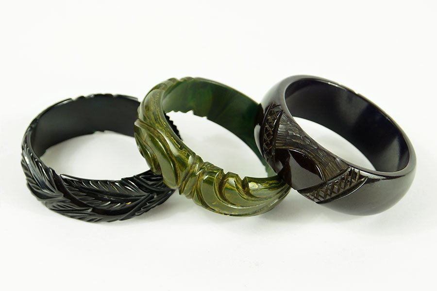 A Black Bakelite Carved Leaf Bangle Bracelet. (1 of 1)