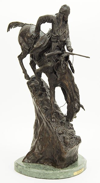 After Frederic Remington Mountain Man.: After Frederic Remington Mountain Man. Patinated bronze sculpture, raised on a 1.5" marble base Overall height: 26"