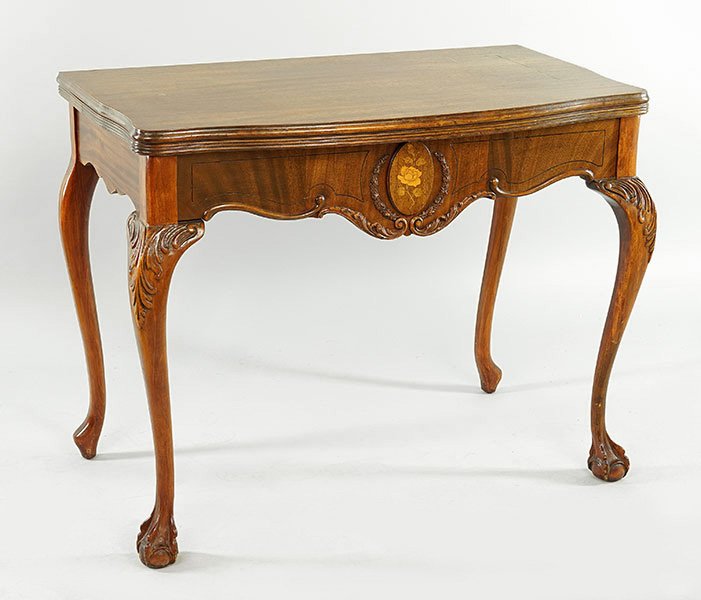 A Carved Mahogany Flip Top Table. (1 of 1)