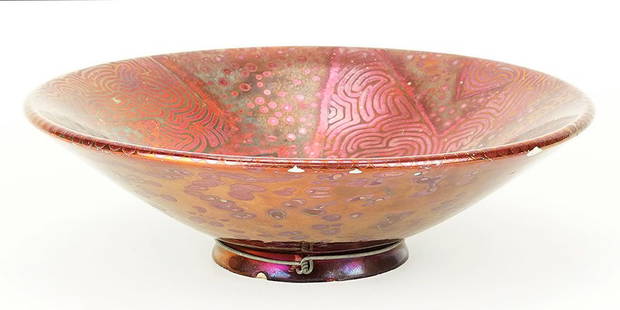 Attributed to Lucien Levy-Dhurmer (French, 1865-1953) A: Attributed to Lucien Levy-Dhurmer (French, 1865-1953) A Massier Bowl. Metallic red luster glaze over turquoise footed bowl is decorated with triangles, zig zags, and dots throughout. Unsigned 2.5" x 8