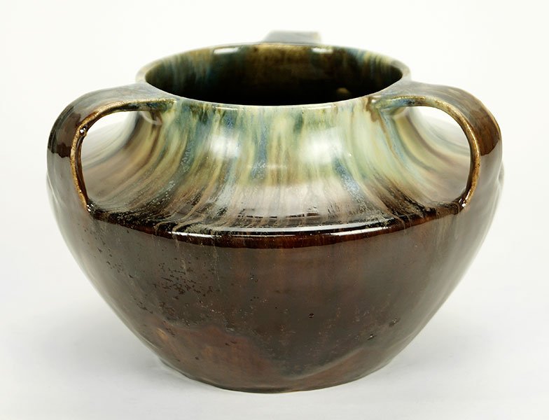School of Koloman Moser (Austrian, 1868-1918) A Bowl.: School of Koloman Moser (Austrian, 1868-1918) A Bowl. Low pottery bowl with a wide round opening that flared out at the shoulders before is tapers downward. Three support arms come out from the openin