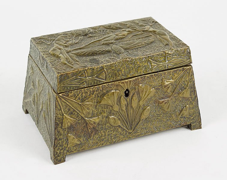 A French L'Arts Practique Jewelry Casket.: A French L'Arts Practique Jewelry Casket. Egyptian revival style repousse brass over wood jewelry casket depicts flower blossoms along the body of the box, with Egyptian figures and iconography along 