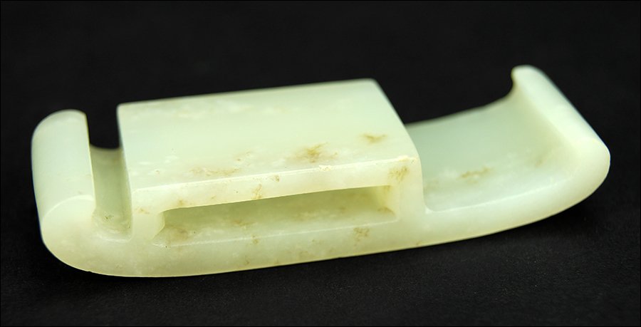 A 19th Century Chinese Carved White Jade Belt Slide. (1 of 1)