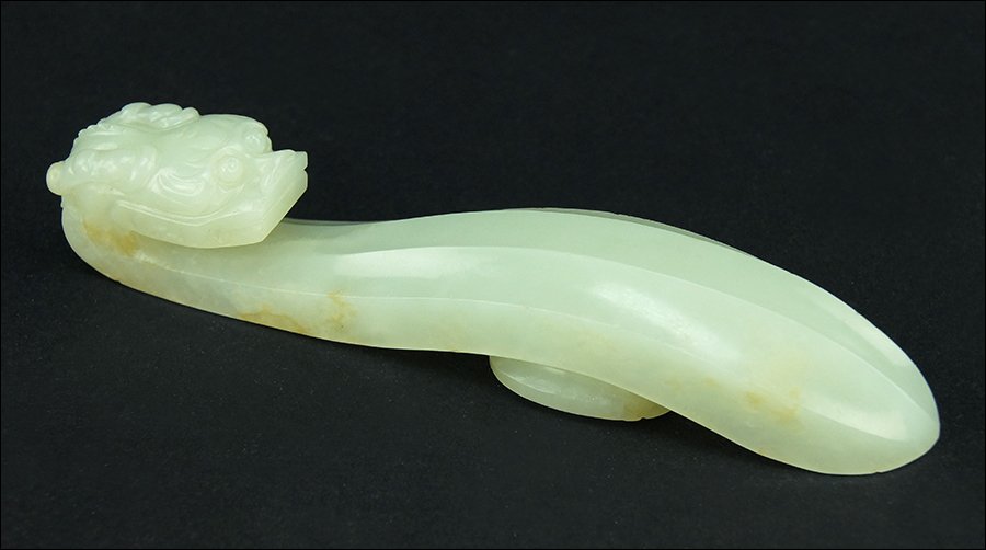 A 19th Century Chinese Celadon Jade Belt Hook. (1 of 5)