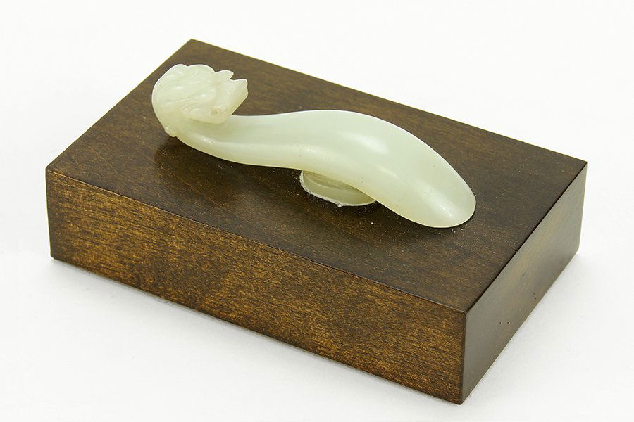 A 19th Century Chinese Carved White Jade Belt Hook. (1 of 1)
