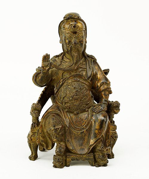A Chinese Patinated Bronze Seated Figure of an Elder. (1 of 1)