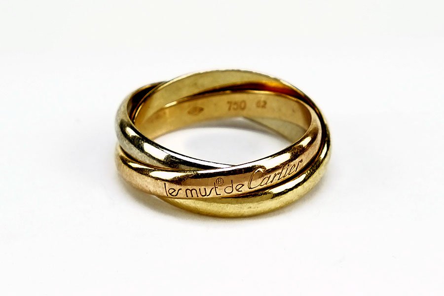 A Cartier 18 Karat Gold Trinity Ring. (1 of 1)