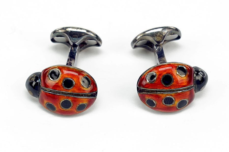 A Pair of Ralph Lauren Ladybug Cufflinks.: A Pair of Ralph Lauren Ladybug Cufflinks. Sterling silver with red and black enamel decoration. Provenance: The Estate Of Payson "Bunky" Cushing