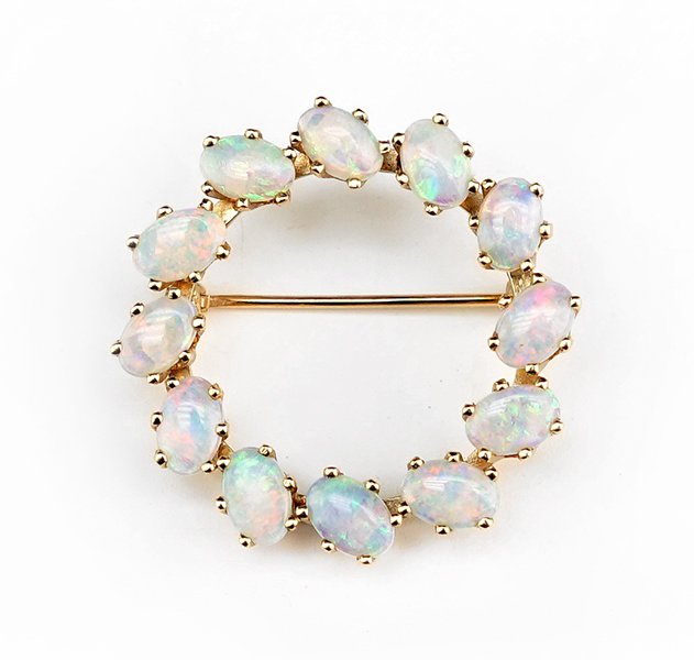 An Opal and 14 Karat Yellow Gold Circle Pin. (1 of 1)