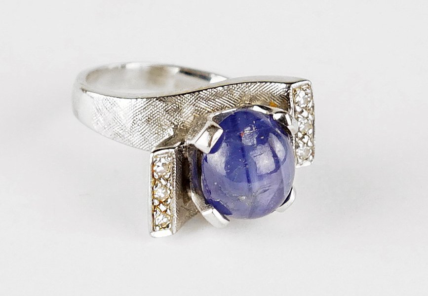 A Star Sapphire, Diamond, And 14 Karat White Gold Ring. (1 of 1)