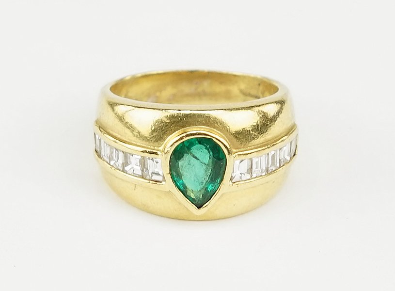 An Emerald, Diamond and 18 Karat Yellow Gold Ring. (1 of 1)