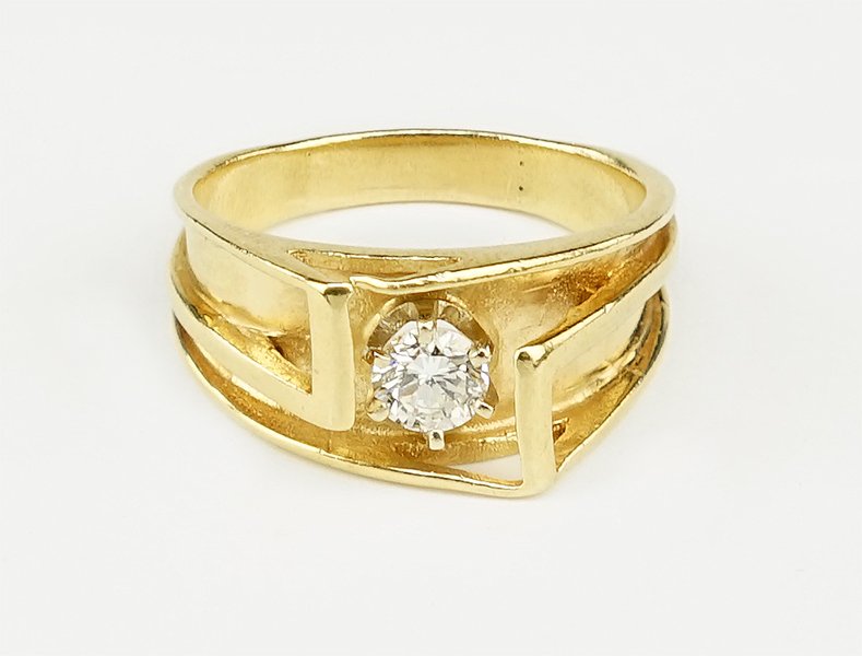 A Diamond and 14 Karat Yellow Gold Ring. (1 of 1)