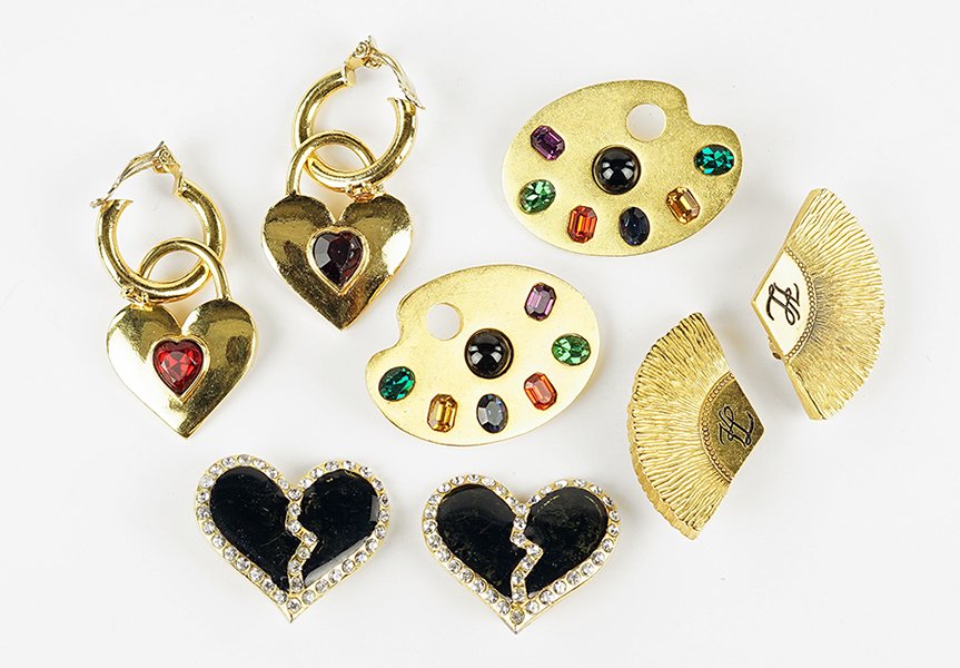 Two Pairs of Karl Lagerfeld Earclips.: Two Pairs of Karl Lagerfeld Earclips. Comprising artist palettes and fans. Together with a pair of Yves Saint Laurent hart form earclips, and a pair of Ciner gold tone hoop earclips with red glass hea