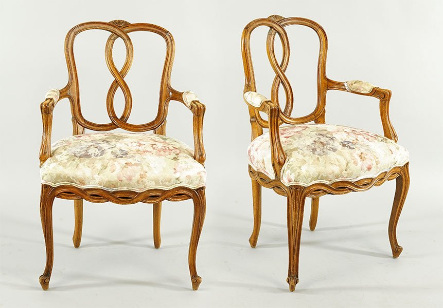 A Pair of French Carved Walnut Fauteuils. (1 of 1)