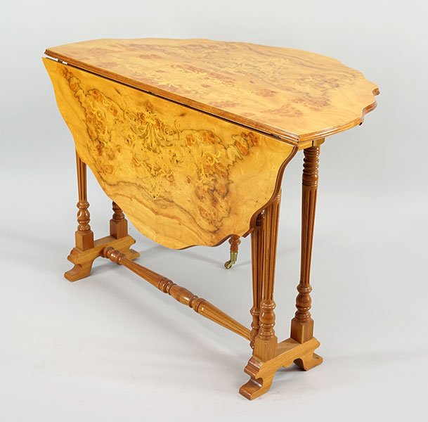 A Marquetry Inlaid Drop Leaf Table. (1 of 1)
