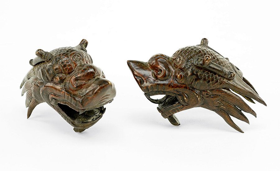 A Pair of Chinese Patinated Bronze Dragon Heads. (1 of 1)