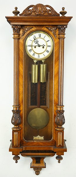 A Carved Walnut Regulator Clock. (1 of 4)