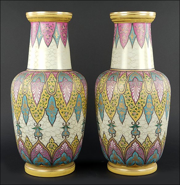 A Pair of Continental Cased Glass Vases.: A Pair of Continental Cased Glass Vases. Gilt and enameled glass vases decorated in the Orientalist style. Unmarked, in the style of Thomas Webb Height: 21"