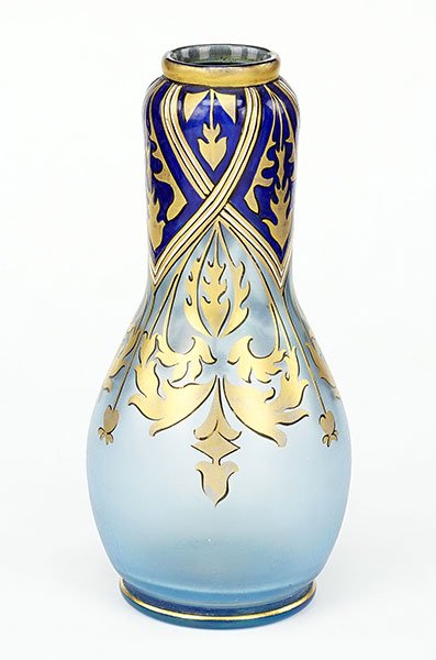 An Art Nouveau Glass Vase.: An Art Nouveau Glass Vase. Iridescent blue glass vase with gilt decoration in the style of Fritz Heckert Height: 6.5"