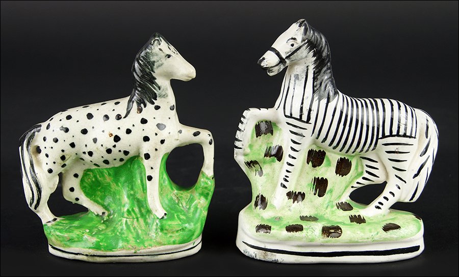 Two 19th Century Staffordshire Pottery Figures of: Two 19th Century Staffordshire Pottery Figures of Animals. Depicting a zebra and a horse