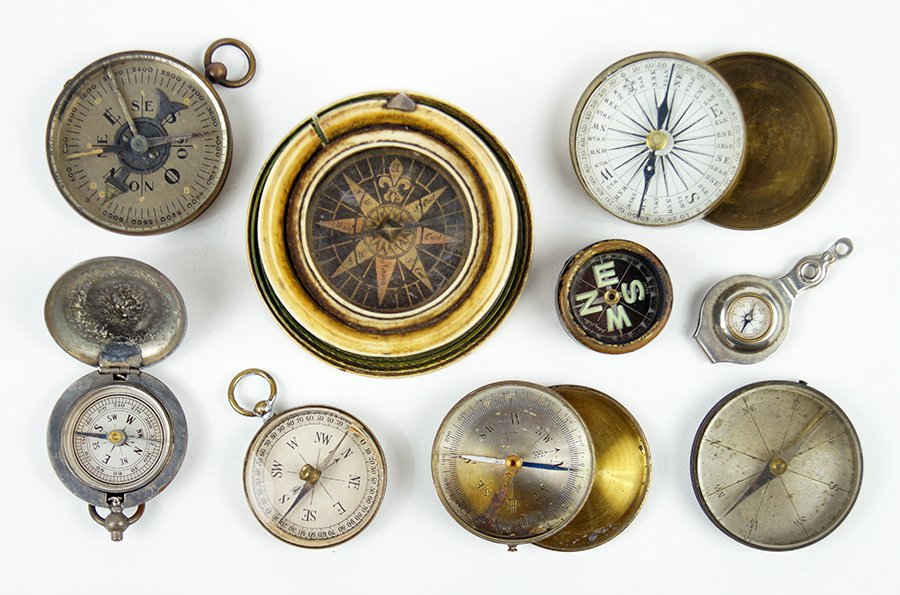 A Collection Of Compasses.: A Collection Of Compasses. Comprising nine compasses Largest: 1.5" x 3.25"