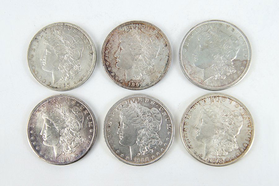 Six Morgan Silver Dollars. (1 of 1)