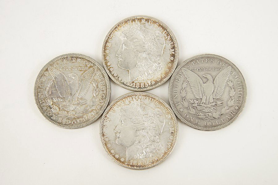 Four Morgan Silver Dollars. (1 of 1)