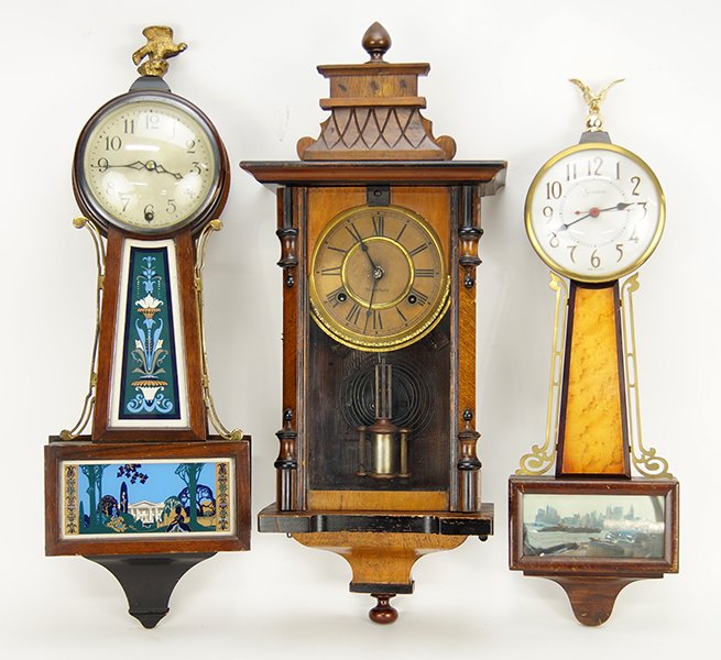 A Waterbury Walnut Wall Clock. (1 of 1)