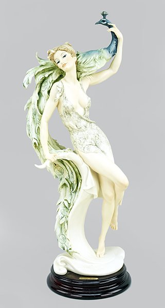 A Giuseppe Armani Figure, 'Woman with Peacock'. (1 of 1)