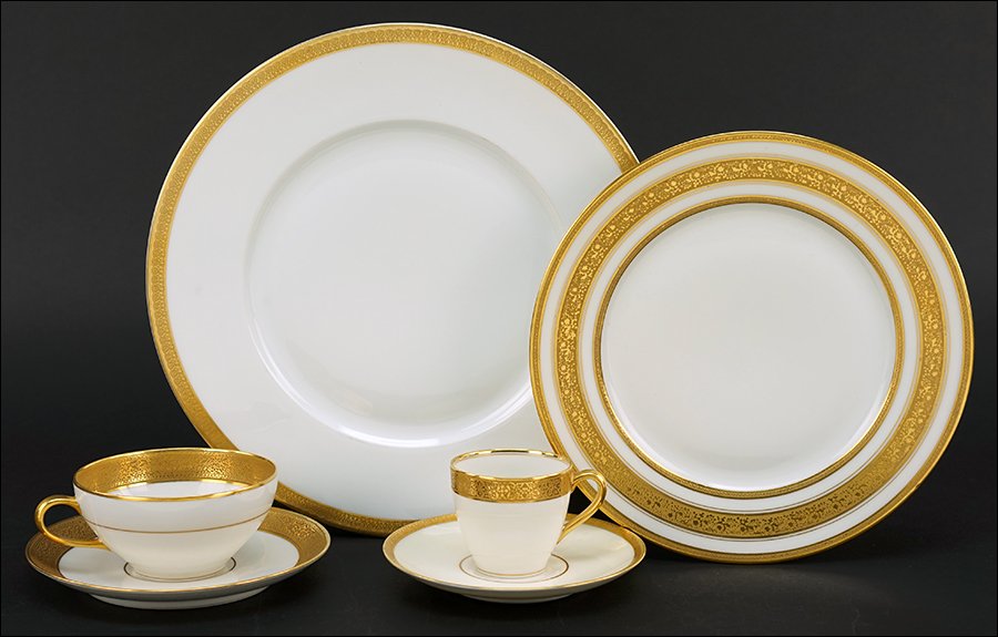 An Assembled Gilt Porcelain Dinner Service. (1 of 1)