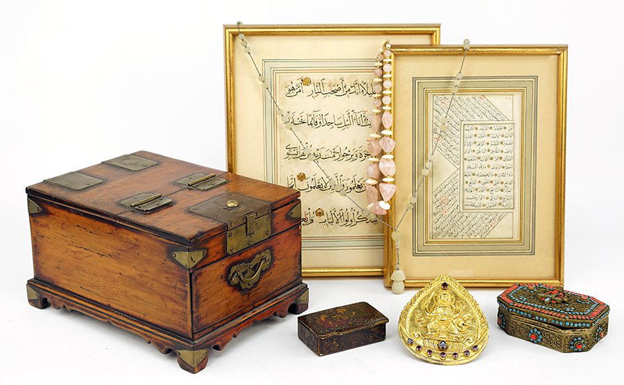 A Tibetan Gilt Copper Plaque. (1 of 1)