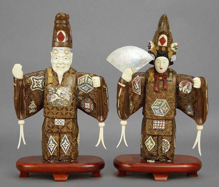 Two Chinese Wood and Bone Figures.: Two Chinese Wood and Bone Figures. Polychrome decorated wood and incised bone inlay, both with abalone shell 'fans' and mounted to 1.25" wood bases Overall heights: 11" each